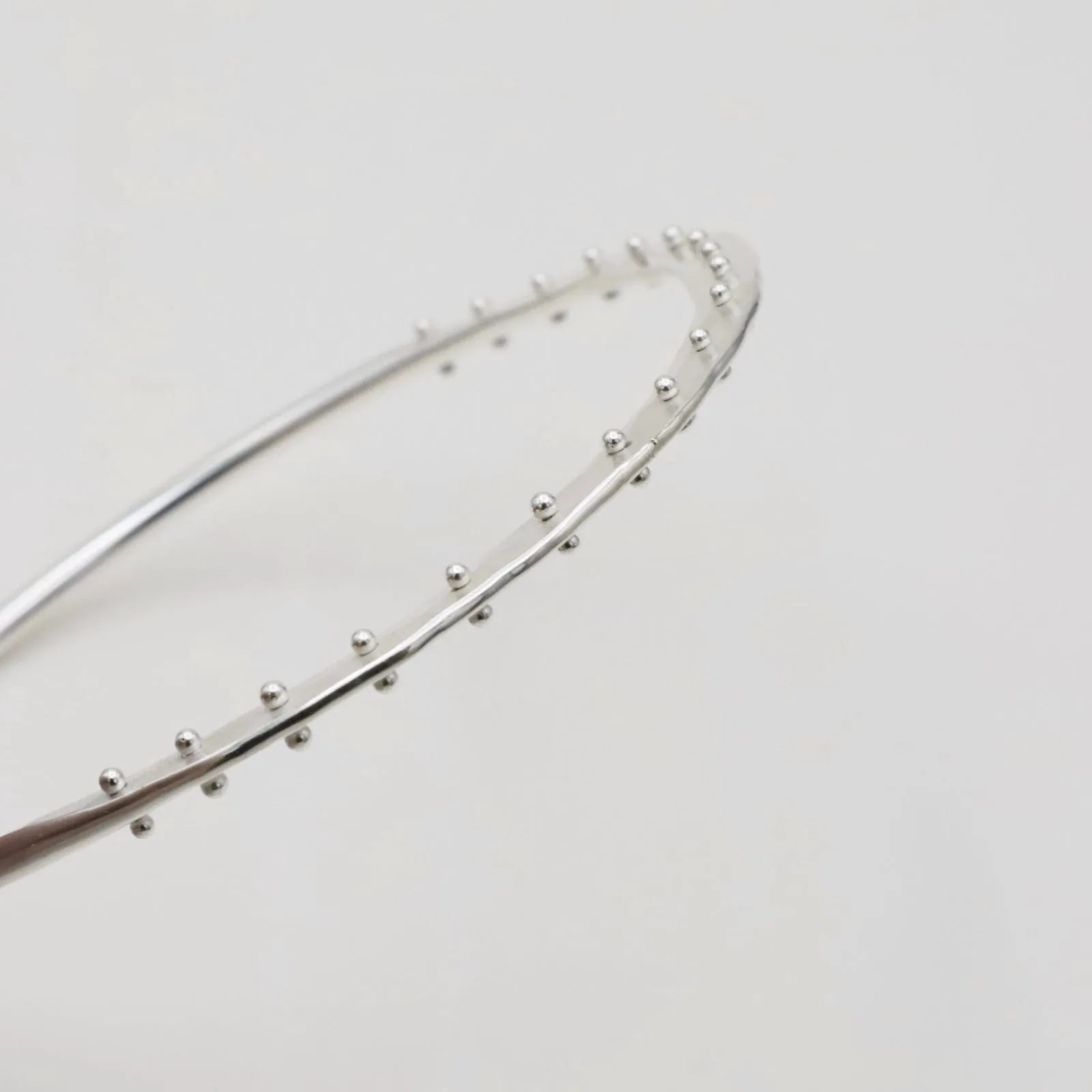 Crescent Bangle in Polished Silver
