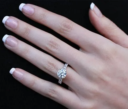 Daisy - Round Moissanite Engagement Ring